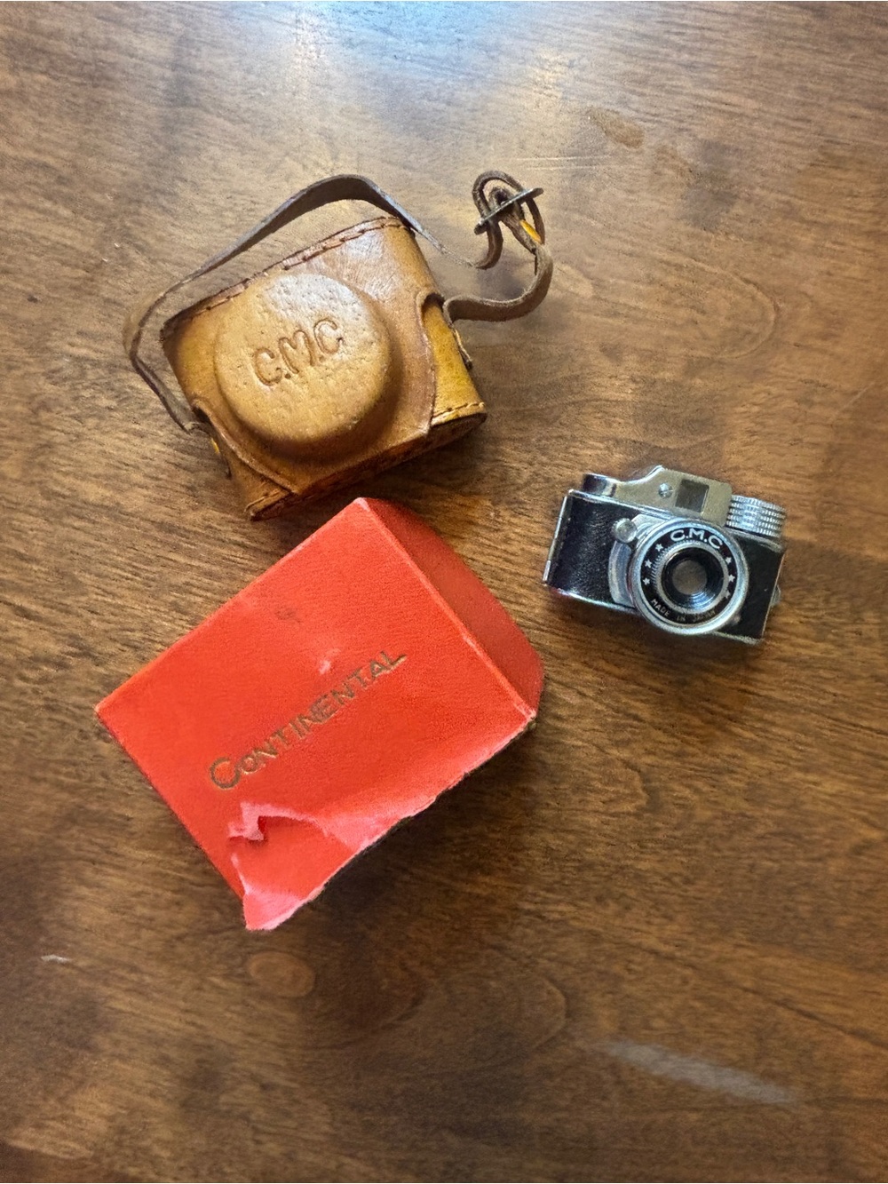 Vintage mini camera with leather case and original box